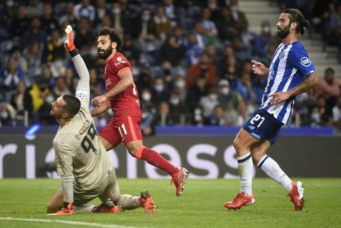 Liverpool forward Mohamed Salah scores against Porto