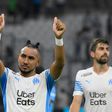 Home comfort: Dimitri Payet gestures towards the fans at the Marseille v Saint-Etienne game on Saturday