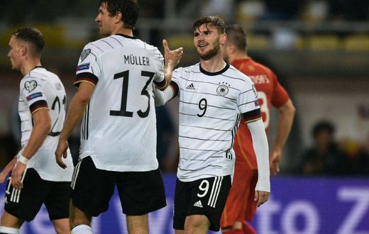 Timo Werner (R) scored twice as Germany qualified for the 2022 World Cup