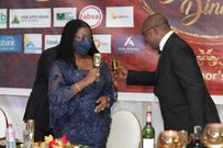 Mrs Elsie Addo Awadzi, right, Second Deputy Governor in a toast with the Dr Ernest Addison, Governor of the Bank of Ghana