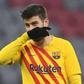 Gerard Pique reacts during Barcelona's 3-0 loss away at Bayern Munich in the Champions League on Wednesday.