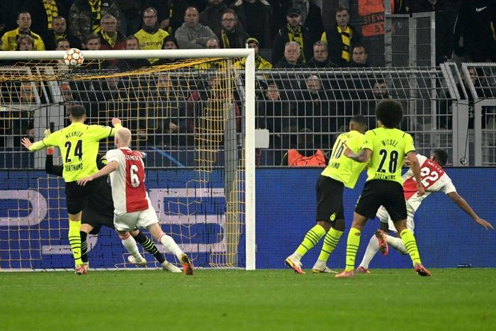 Ajax came from behind to beat Borussia Dortmund and reach the last 16 of the Champions League on Wednesday