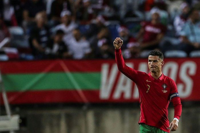 On target: Cristiano Ronaldo celebrates after scoring against Qatar