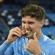 Manchester City defender John Stones signed a new contract till 2026 on Tuesday