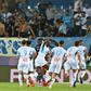 Comeback kings: Marseille celebrate their 3-2 win at Montpellier