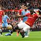 Manchester United centre-back Eric Bailly (R) concedes an own-goal against Manchester City at Old Trafford.