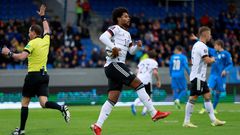 Serge Gnabry celebrates scoring Germany's opening goal against Iceland in Reykjavik