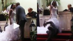 Groom rolls on the floor as anointing throws him off the altar after kissing bride (video)