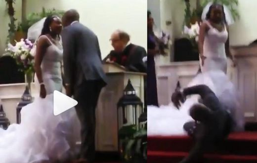 Groom rolls on the floor as anointing throws him off the altar after kissing bride (video)