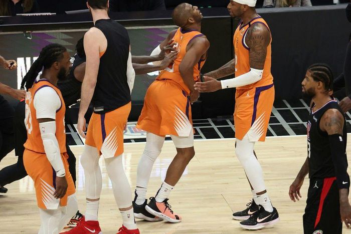 Patrick Beverley, back left, was issued a one-game ban by the NBA on Saturday for shoving Chris Paul in the fourth quarter of an NBA playoff game on Wednesday