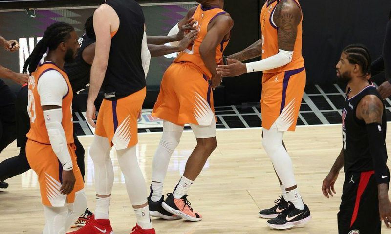 Patrick Beverley, back left, was issued a one-game ban by the NBA on Saturday for shoving Chris Paul in the fourth quarter of an NBA playoff game on Wednesday