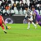 Juan Cuadrado lines up his match-winning shot against Fiorentina