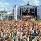 Germany head coach Joachim Loew is displayed on a giant screen as thousands of football fans in Berlin celebrate Germany's win at the 2014 World Cup