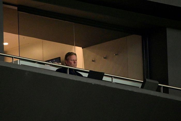 Lonely life: Barcelona coach Ronald Koeman looks on from the stands