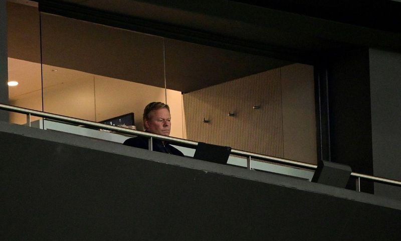 Lonely life: Barcelona coach Ronald Koeman looks on from the stands