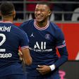Kylian Mbappe celebrates with Achraf Hakimi after scoring PSG's second goal against Reims