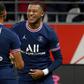 Kylian Mbappe celebrates with Achraf Hakimi after scoring PSG's second goal against Reims