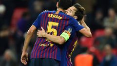 Sergio Busquets congratulates Lionel Messi on a Champions League goal in 2018