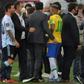 Argentina's Lionel Messi (L) and Brazil's Neymar are seen after the two teams' World Cup qualifier was halted by Brazilian health officials in Sao Paulo