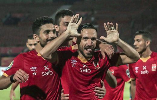 Defender Ali Maaloul (C) and teammates from Egyptian club Al Ahly celebrate a goal en route to winning the 2021 CAF Champions League