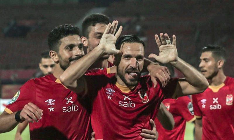 Defender Ali Maaloul (C) and teammates from Egyptian club Al Ahly celebrate a goal en route to winning the 2021 CAF Champions League