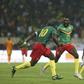 Cameroon forward Karl Toko Ekambi (C) celebrates after scoring the goal that beat the Ivory Coast on Tuesday in a World Cup qualifier in Yaounde