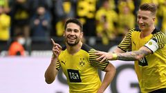 Raphael Guerreiro (L) is set to return for Dortmund on Saturday after missing the last seven games with injury