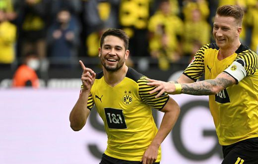 Raphael Guerreiro (L) is set to return for Dortmund on Saturday after missing the last seven games with injury