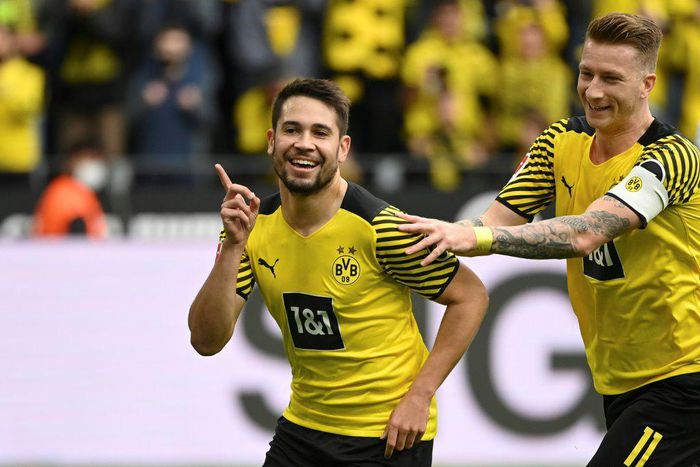 Raphael Guerreiro (L) is set to return for Dortmund on Saturday after missing the last seven games with injury