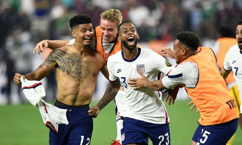 USA's Miles Robinson (left) celebrates winning the CONCACAF Gold Cup final with a 1-0 victory over Mexico in Las Vegas