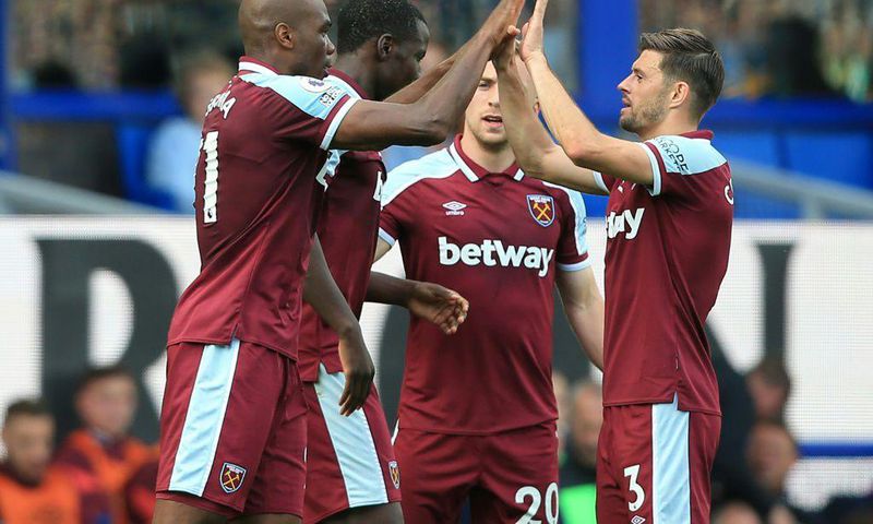 West Ham defender Angelo Ogbonna (L) celebrates after scoring at Everton