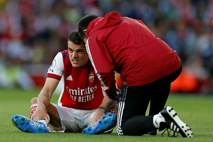 Arsenal midfielder Granit Xhaka receives treatment