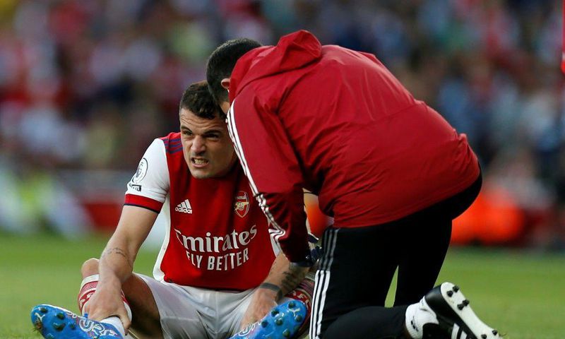 Arsenal midfielder Granit Xhaka receives treatment