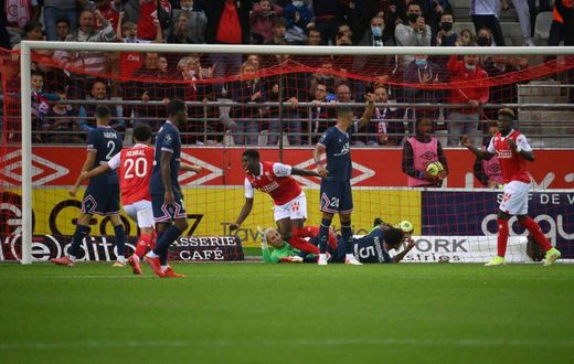 Zimbabwean Marshall Munetsi (C) celebrates after putting the ball in the net for Reims against Paris Saint-Germain, but the goal was disallowed for offside