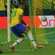 Raphinha (right) scored a brace on his first start for Brazil