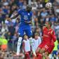 Chelsea held out with 10 men for a full half to draw 1-1 at Liverpool
