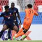 Abused: France midfielder Aurelien Tchouameni (left)