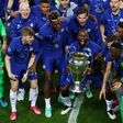 Chelsea players with the Champions League trophy after beating Manchester City in last season's final in Porto