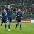 Spot on: Lyndon Dykes's penalty earned Scotland a crucial 1-0 win in Austria