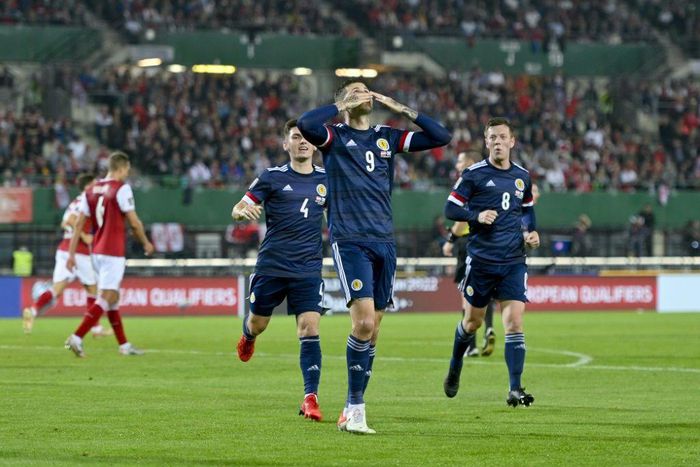 Spot on: Lyndon Dykes's penalty earned Scotland a crucial 1-0 win in Austria