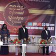Mr Charles Ofori Acquah, CEO of CIB Ghana giving his address with the leadership of the Central Bank behind him