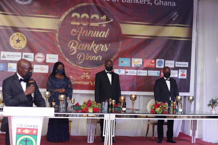 Mr Charles Ofori Acquah, CEO of CIB Ghana giving his address with the leadership of the Central Bank behind him