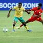 Teboho Mokoena (L) of South Africa and Suteman Hamid (R) of Ethiopia contest possession during a World Cup qualifier in Johannesburg on Tuesday.