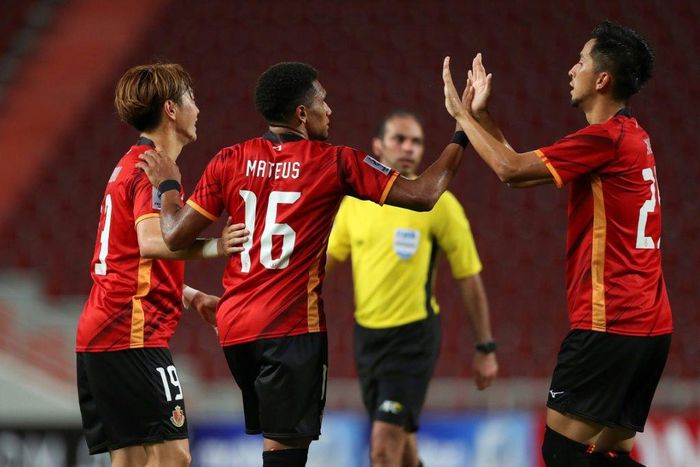 Nagoya Grampus' Mateus Castro (C) celebrates after scoring against Ratchaburi