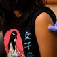A band-aid is placed on the arm of a 12 year old child after they received a first dose of the Pfizer Covid-19 vaccine after it was approved for use by the FDA in children 12 and over at a Los Angeles County mobile vaccination clinic on May 14, 2021 in...
