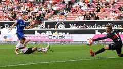 Florian Wirtz (L) scores the deciding goal to seal Leverkusen's 3-1 win at Stuttgart on Sunday