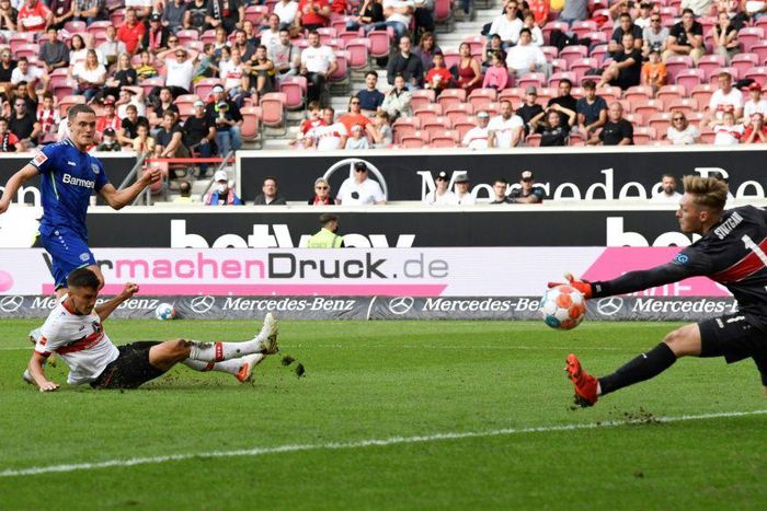 Florian Wirtz (L) scores the deciding goal to seal Leverkusen's 3-1 win at Stuttgart on Sunday