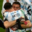 Lionel Messi celebrates with goalkeeeper Emiliano Martinez whose three penalty shoot-out saves sent Argentina into the Copa America final