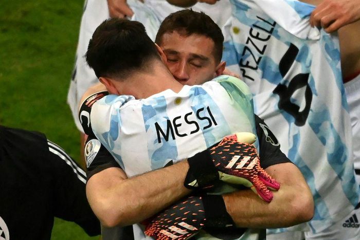 Lionel Messi celebrates with goalkeeeper Emiliano Martinez whose three penalty shoot-out saves sent Argentina into the Copa America final