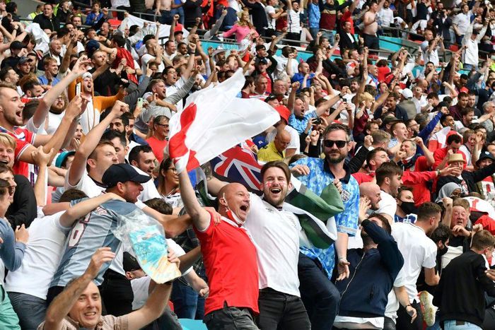 England supporters celebrate their team's win over Germany at Wembley